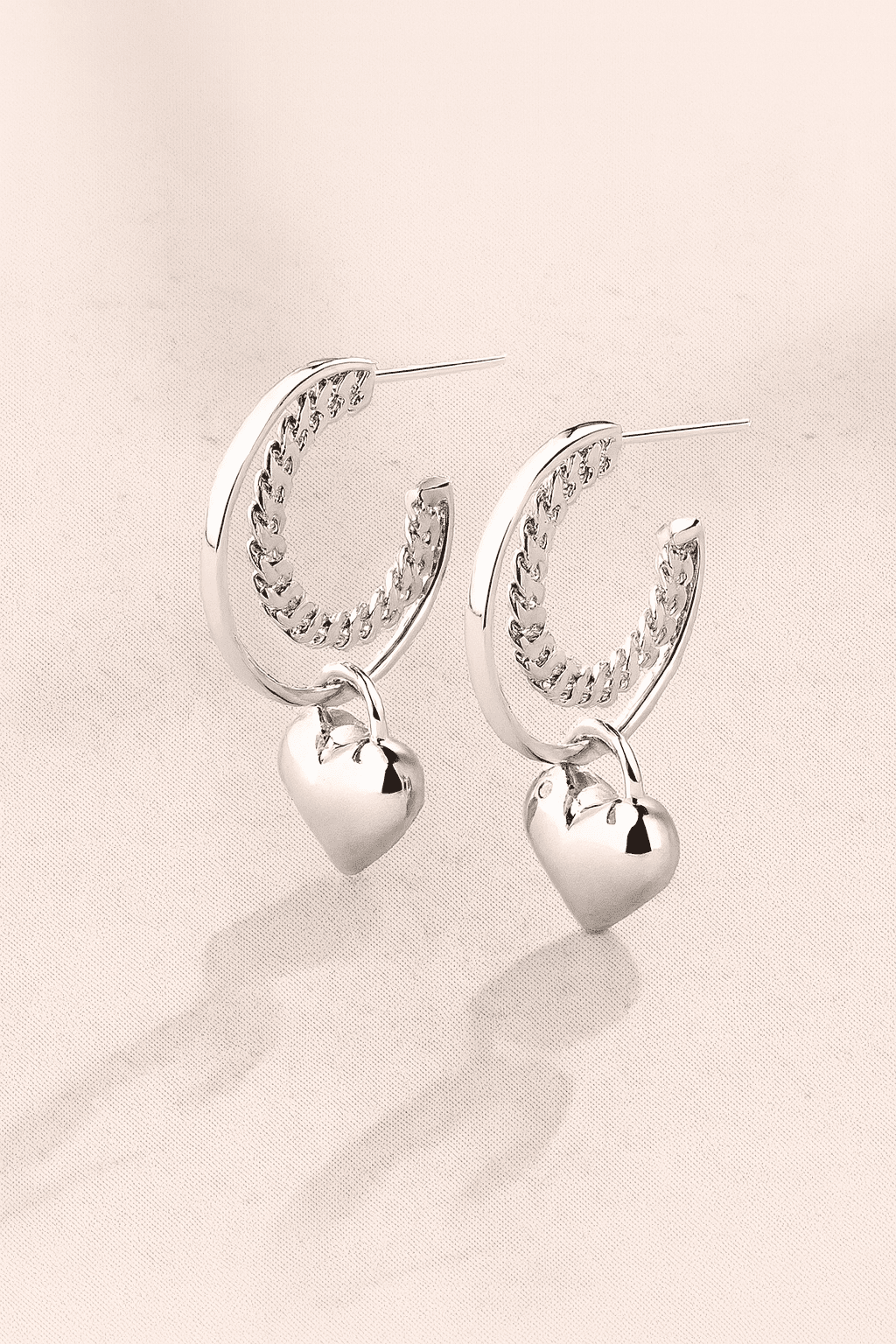 56B8A7F2-7C43-4491-A9E3-376309BA21B3 heart hoop earrings